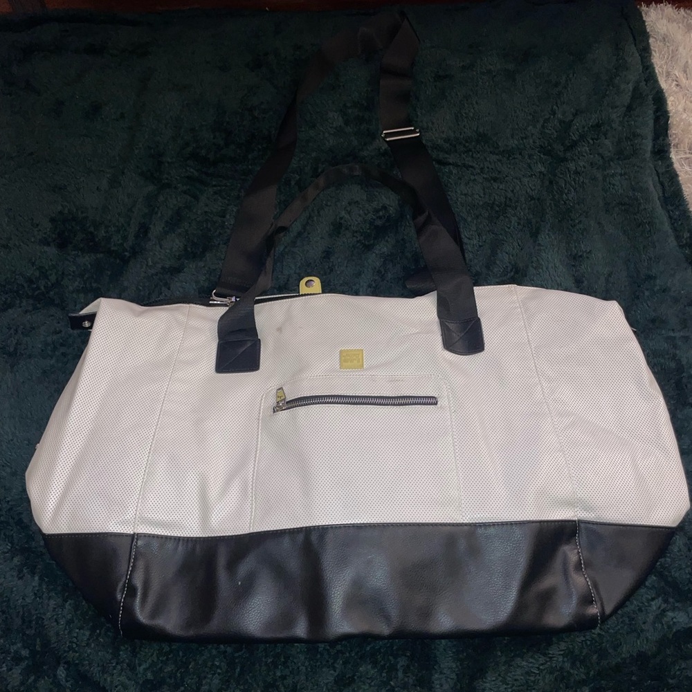 Black and white duffel bag